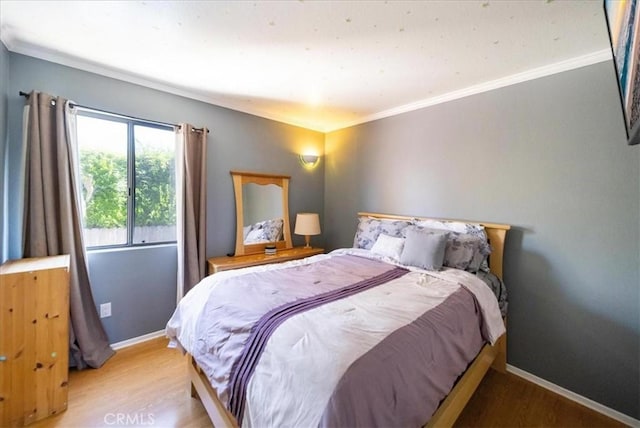 5963 Rio Valle Dr, Bonsall, CA 92003 - bedroom featuring light wood finished floors and ornamental molding