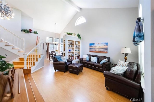 5963 Rio Valle Dr, Bonsall, CA 92003 - living area with a chandelier, stairway, high vaulted ceiling, light wood-style flooring, and beam ceiling