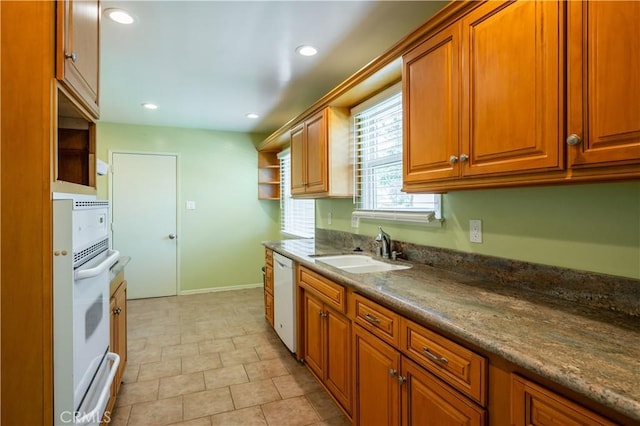 2340 W Saint Anne Pl, Santa Ana, CA 92704 - kitchen featuring open shelves, white appliances, brown cabinets, a warming drawer, and recessed lighting