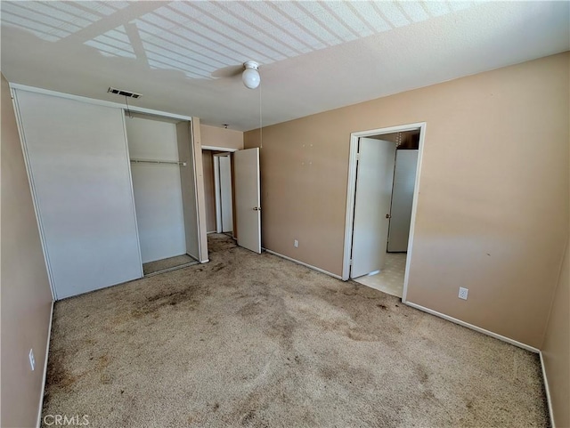 9510 Nickellaus Ct, Corona, CA 92883 - unfurnished bedroom featuring carpet floors, a closet, and ceiling fan