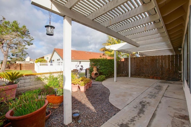 6767 Camino Del Prado, Carlsbad, CA 92011 - fenced backyard with a patio and a pergola