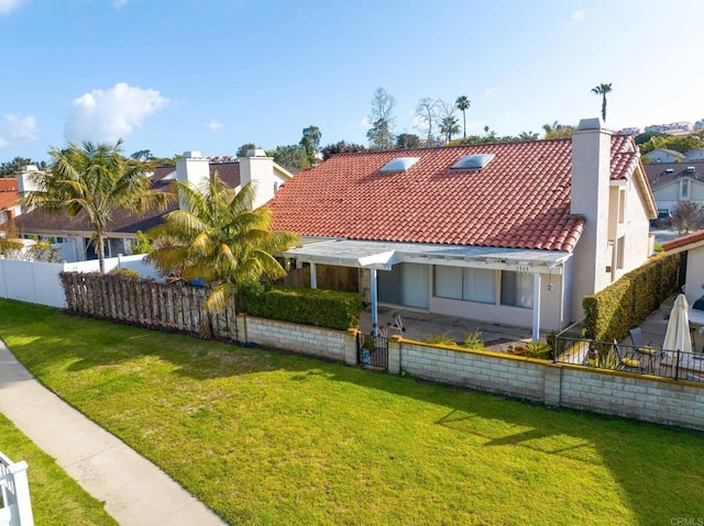 6767 Camino Del Prado, Carlsbad, CA 92011 - rear view of property featuring a tiled roof, stucco siding, and a chimney