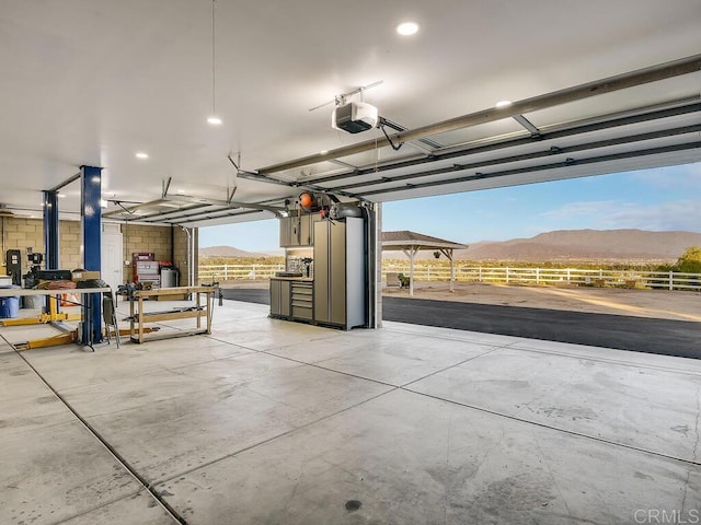 31755 Rancho Vista Rd, Temecula, CA 92592 - garage with a mountain view and a garage door opener