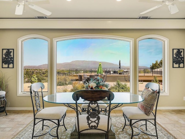 31755 Rancho Vista Rd, Temecula, CA 92592 - dining room featuring a ceiling fan, a mountain view, stone tile floors, and recessed lighting