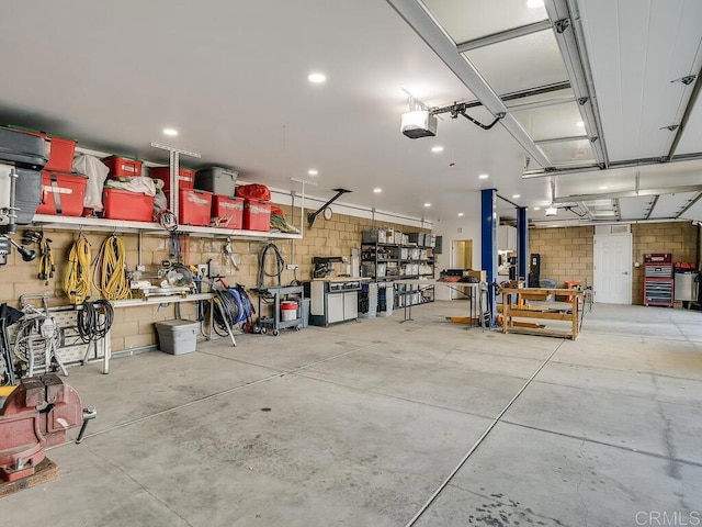 31755 Rancho Vista Rd, Temecula, CA 92592 - garage with a garage door opener and a workshop area