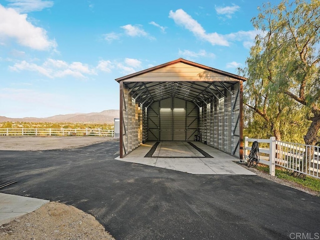 31755 Rancho Vista Rd, Temecula, CA 92592 - view of car parking with a mountain view, a carport, and driveway