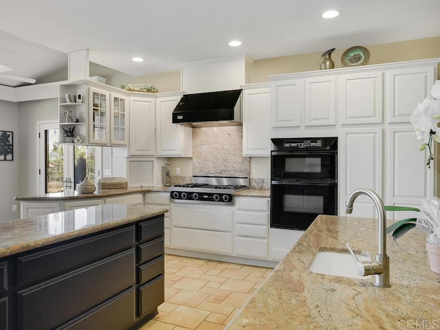 31755 Rancho Vista Rd, Temecula, CA 92592 - kitchen with custom range hood, white cabinets, stainless steel gas cooktop, decorative backsplash, and recessed lighting