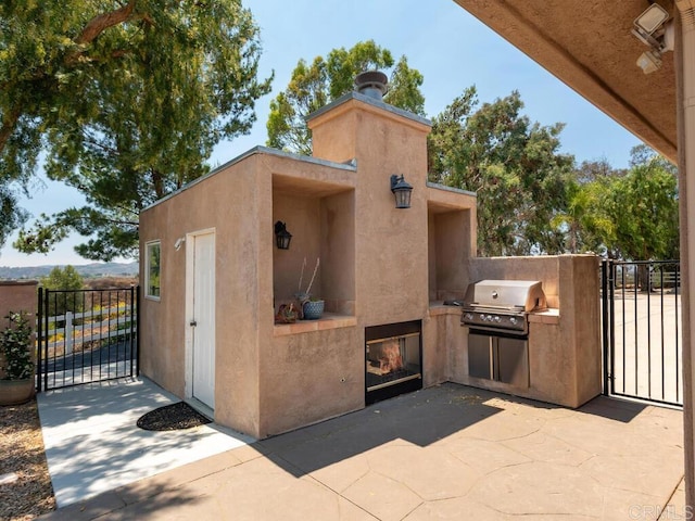 31755 Rancho Vista Rd, Temecula, CA 92592 - view of patio / terrace featuring a gate and area for grilling