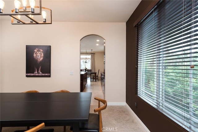 25919 Matlin Rd, Ramona, CA 92065 - carpeted dining area with a chandelier and arched walkways