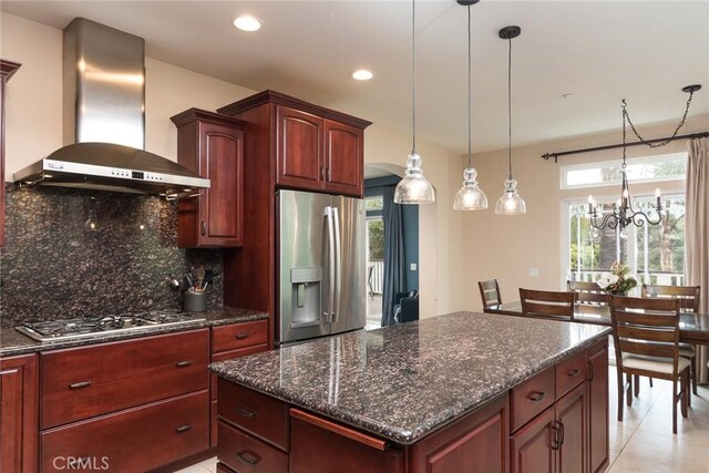 25919 Matlin Rd, Ramona, CA 92065 - kitchen with appliances with stainless steel finishes, wall chimney range hood, a chandelier, backsplash, and a kitchen island