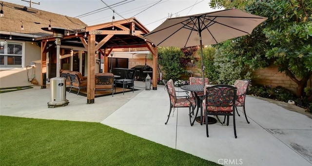 5101 Caspian Cir, Huntington Beach, CA 92649 - fenced backyard with a gazebo, a patio area, an outdoor hangout area, and outdoor dining area