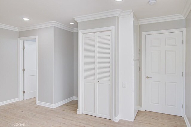 767 Calle Aragon Unit A, Laguna Woods, CA 92637 - unfurnished bedroom featuring a closet, light wood finished floors, recessed lighting, and crown molding