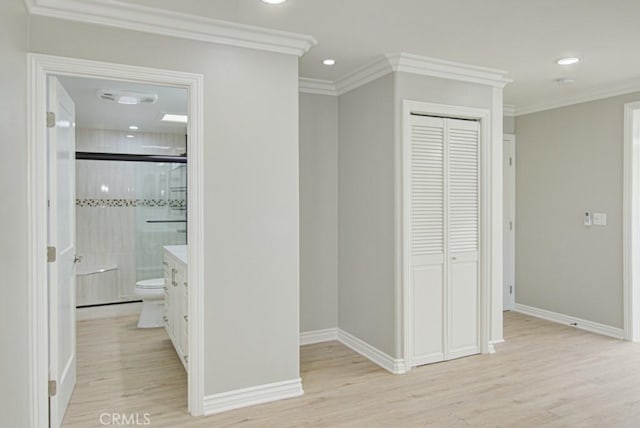 767 Calle Aragon Unit A, Laguna Woods, CA 92637 - hallway featuring light wood-style floors, ornamental molding, and recessed lighting
