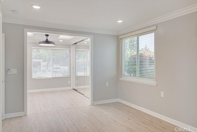767 Calle Aragon Unit A, Laguna Woods, CA 92637 - spare room with ornamental molding, wood finished floors, a smoke detector, and recessed lighting