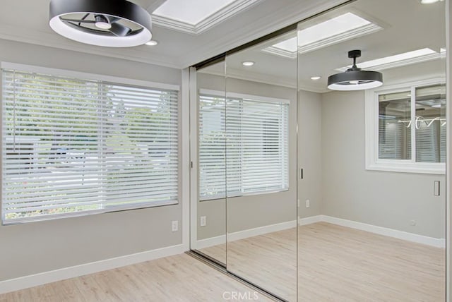 767 Calle Aragon Unit A, Laguna Woods, CA 92637 - unfurnished bedroom with crown molding, wood finished floors, a closet, and recessed lighting