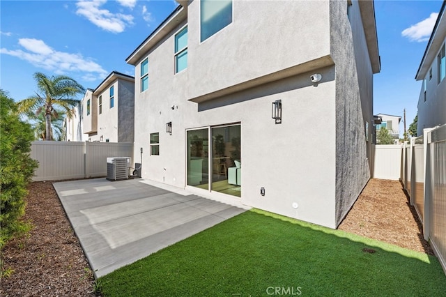 16221 Orizaba Ave, Paramount, CA 90723 - rear view of house with a fenced backyard, a patio, and stucco siding