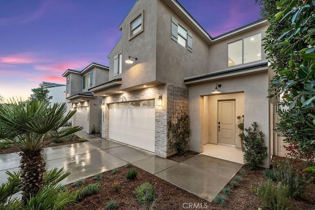 16221 Orizaba Ave, Paramount, CA 90723 - multi unit property with stone siding, a garage, and stucco siding
