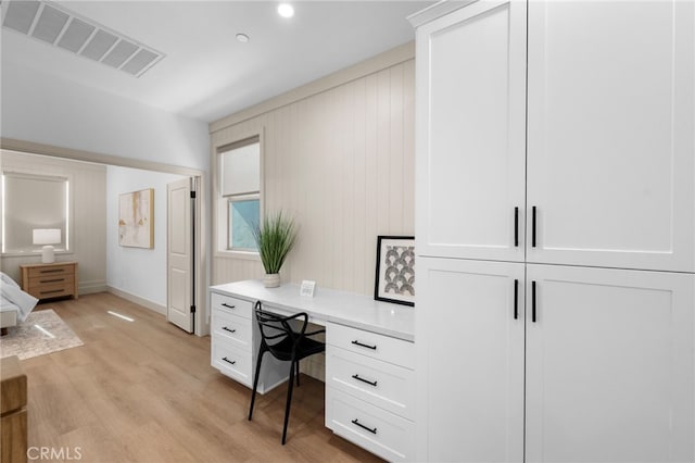 16221 Orizaba Ave, Paramount, CA 90723 - office area featuring built in study area and light wood finished floors