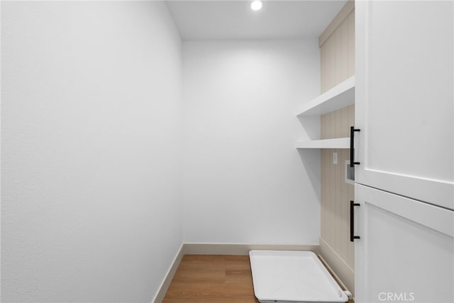 16221 Orizaba Ave, Paramount, CA 90723 - laundry room with recessed lighting and wood finished floors