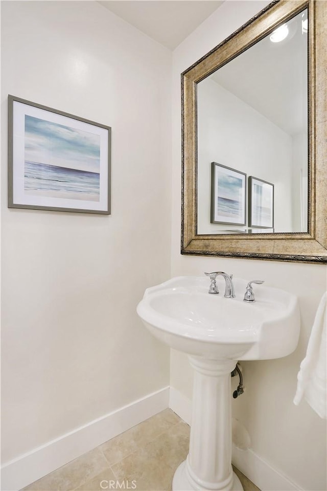 617 Iris Ave, Corona Del Mar, CA 92625 - bathroom with baseboards and tile patterned flooring