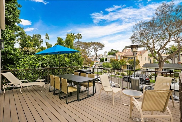 617 Iris Ave, Corona Del Mar, CA 92625 - wooden terrace with outdoor dining space and a residential view