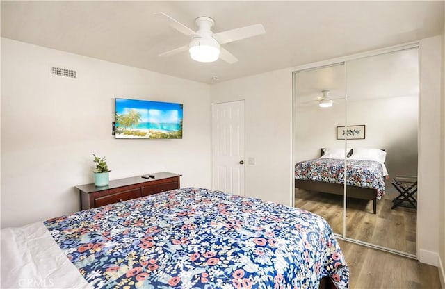 617 Iris Ave, Corona Del Mar, CA 92625 - bedroom with wood finished floors, ceiling fan, and a closet
