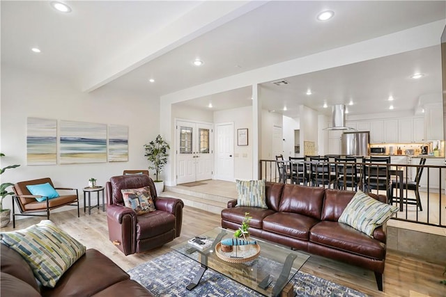 617 Iris Ave, Corona Del Mar, CA 92625 - living room featuring light wood finished floors, recessed lighting, and beamed ceiling