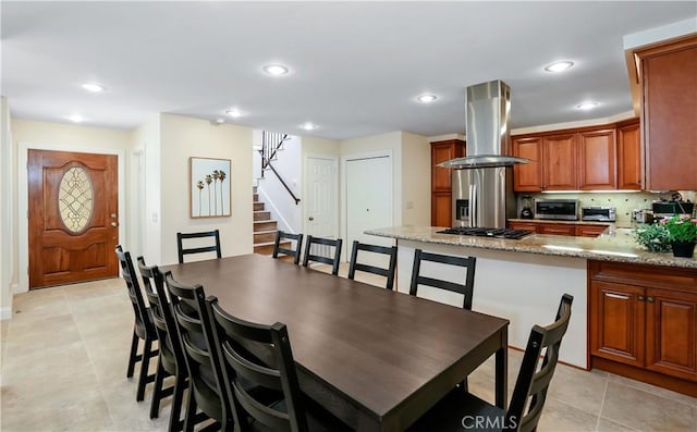 617 Iris Ave, Corona Del Mar, CA 92625 - dining room with stairs, light tile patterned flooring, and recessed lighting