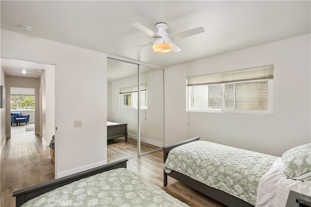 617 Iris Ave, Corona Del Mar, CA 92625 - bedroom with wood finished floors, a closet, and a ceiling fan