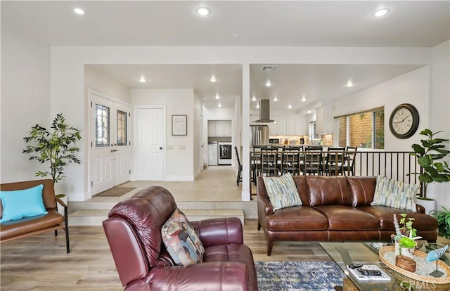 617 Iris Ave, Corona Del Mar, CA 92625 - living room featuring recessed lighting and light wood-style floors