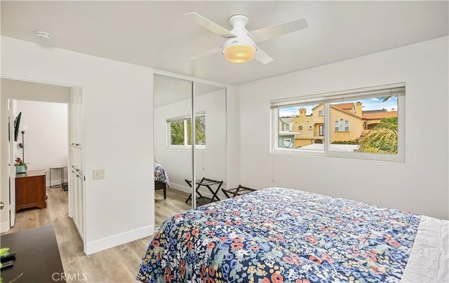 617 Iris Ave, Corona Del Mar, CA 92625 - bedroom with light wood finished floors, a closet, and a ceiling fan