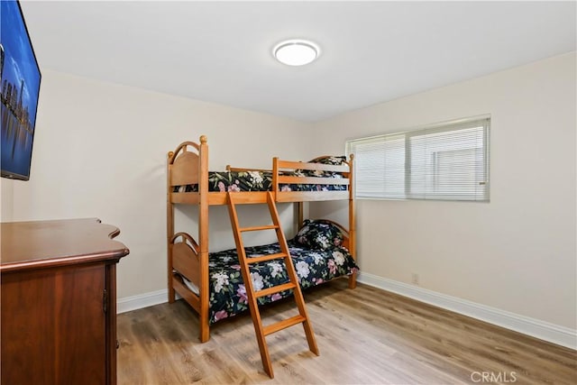 617 Iris Ave, Corona Del Mar, CA 92625 - bedroom with wood finished floors and baseboards