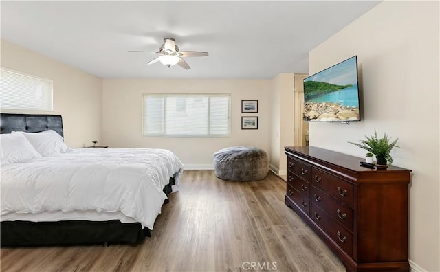 617 Iris Ave, Corona Del Mar, CA 92625 - bedroom with light wood-type flooring and ceiling fan
