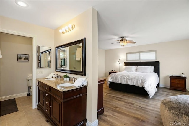 617 Iris Ave, Corona Del Mar, CA 92625 - bedroom with light wood-type flooring and ceiling fan