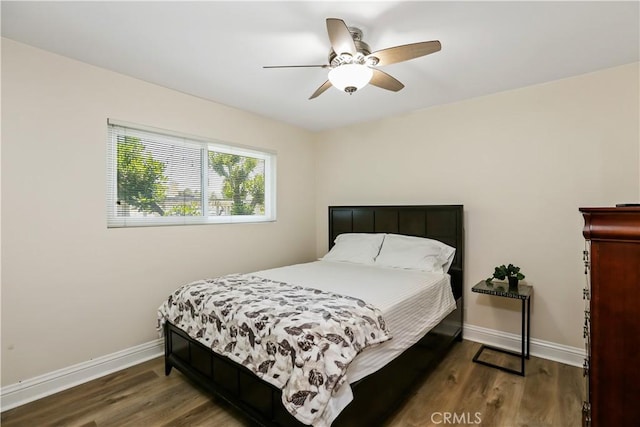617 Iris Ave, Corona Del Mar, CA 92625 - bedroom with wood finished floors and a ceiling fan