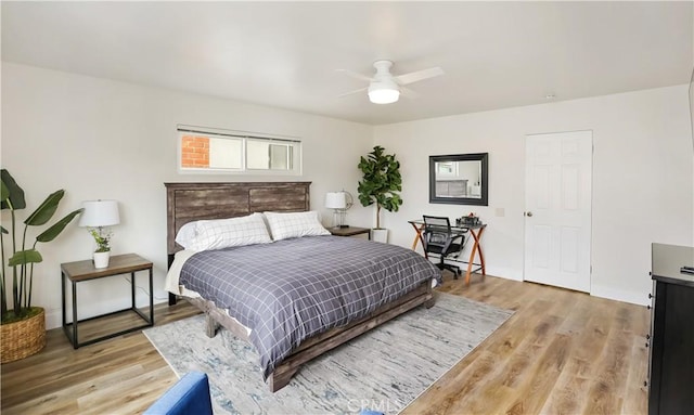 617 Iris Ave, Corona Del Mar, CA 92625 - bedroom with light wood-style floors and a ceiling fan