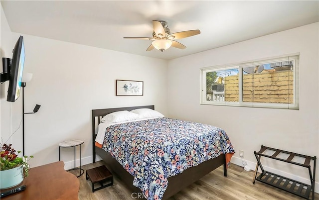 617 Iris Ave, Corona Del Mar, CA 92625 - bedroom featuring wood finished floors and a ceiling fan