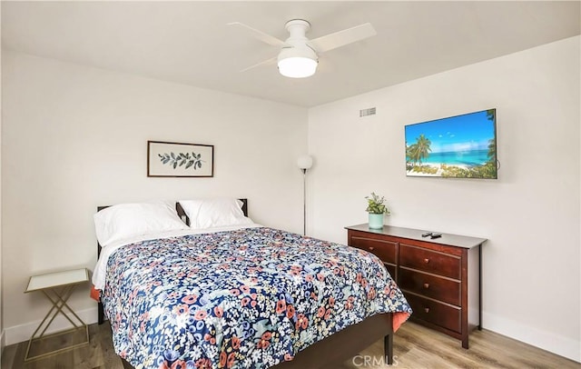 617 Iris Ave, Corona Del Mar, CA 92625 - bedroom featuring wood finished floors and ceiling fan