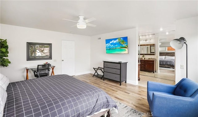 617 Iris Ave, Corona Del Mar, CA 92625 - bedroom with light wood-type flooring, connected bathroom, and ceiling fan