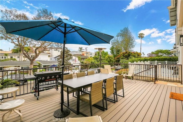 617 Iris Ave, Corona Del Mar, CA 92625 - wooden deck featuring outdoor dining area and a grill
