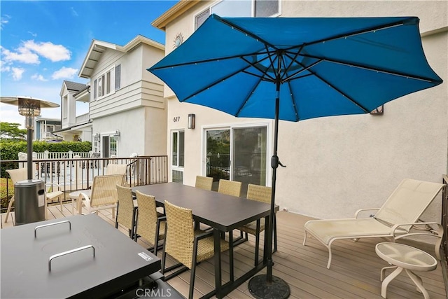 617 Iris Ave, Corona Del Mar, CA 92625 - wooden terrace with outdoor dining area