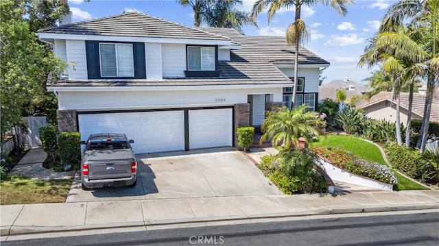 2305 Via Zafiro, San Clemente, CA 92673 - traditional-style house featuring concrete driveway, a garage, and a tiled roof