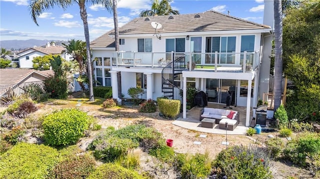 2305 Via Zafiro, San Clemente, CA 92673 - rear view of property featuring a patio, stairway, stucco siding, a chimney, and a tiled roof