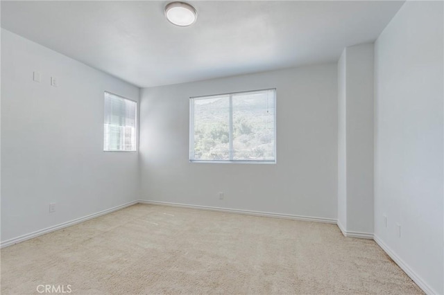 35050 Margo Rd, Lake Elsinore, CA 92530 - empty room with carpet floors and baseboards