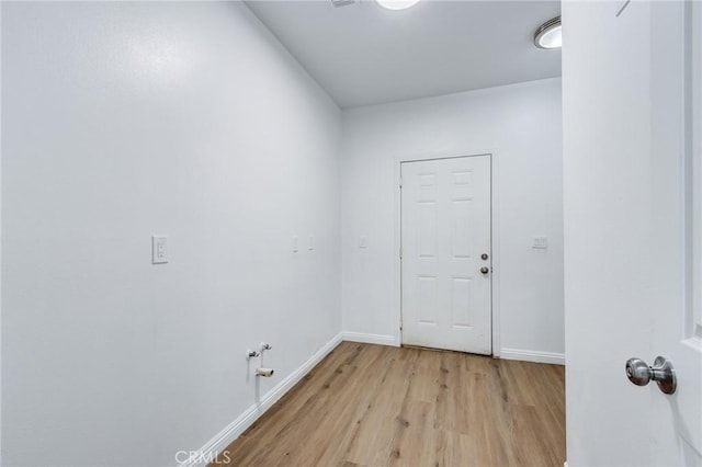 35050 Margo Rd, Lake Elsinore, CA 92530 - laundry area with light wood-style flooring and gas dryer hookup