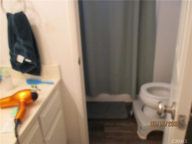 9244 Whitting Way, Riverside, CA 92508 - full bathroom featuring wood finished floors and curtained shower