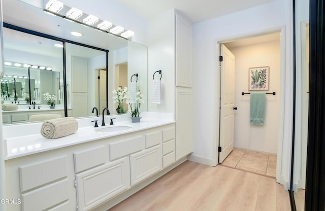 307 E Walnut Ave Unit D, Monrovia, CA 91016 - bathroom with vanity and wood finished floors