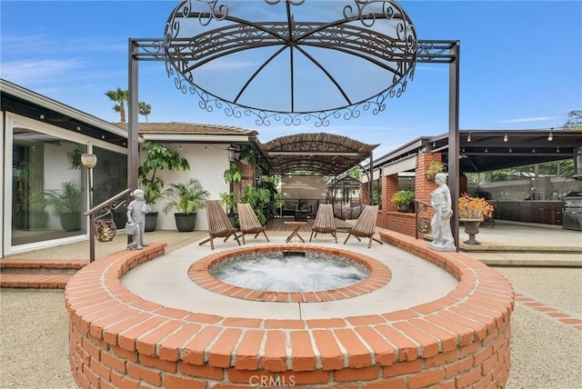 1115 E Sierra Madre Ave, Glendora, CA 91741 - view of patio / terrace featuring an in-ground hot tub and a grill