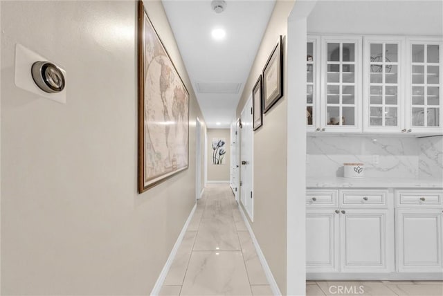 1115 E Sierra Madre Ave, Glendora, CA 91741 - hall featuring light marble finish floors and baseboards