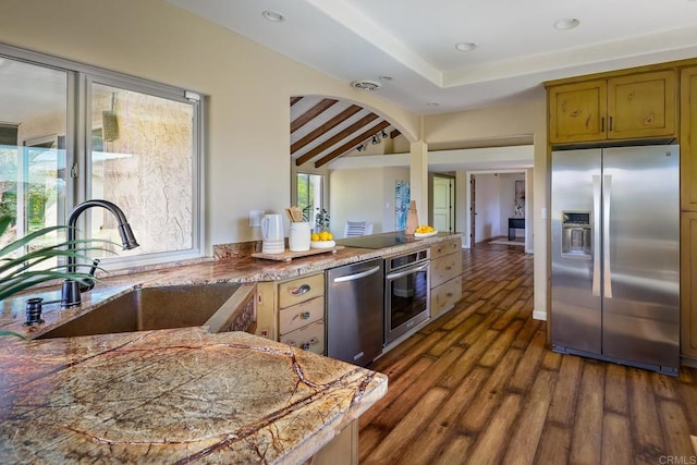 12870 Circulo Dardo, San Diego, CA 92128 - kitchen featuring appliances with stainless steel finishes, dark wood-style flooring, lofted ceiling, and recessed lighting